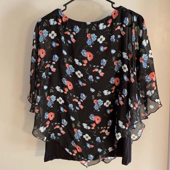 Floral pattern shear poncho with attached black tank top. - Picture 2 of 3